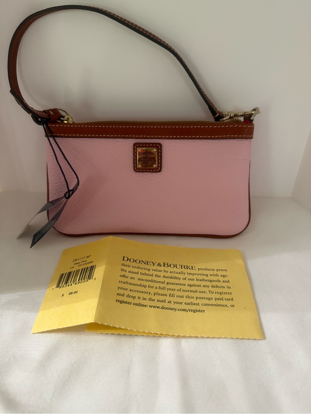 Dooney & Bourke Pink Leather Wristlet with Brown Trim